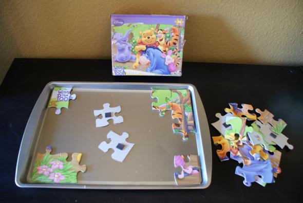 10 Car Activities for Toddlers - Magnetic Puzzle via @stitchesandpress